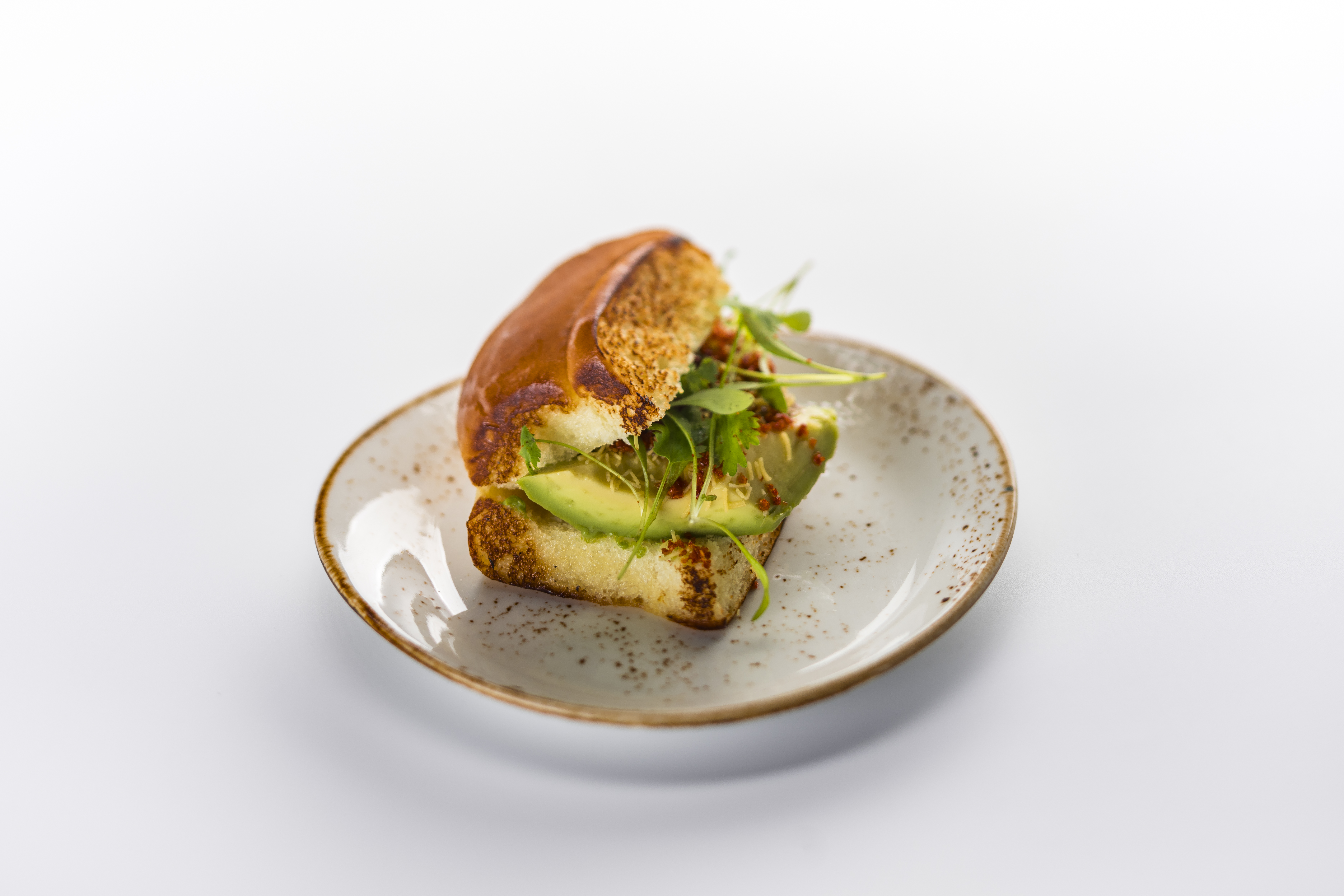 Indian-inspired butter-toasted sliders with CA avocado