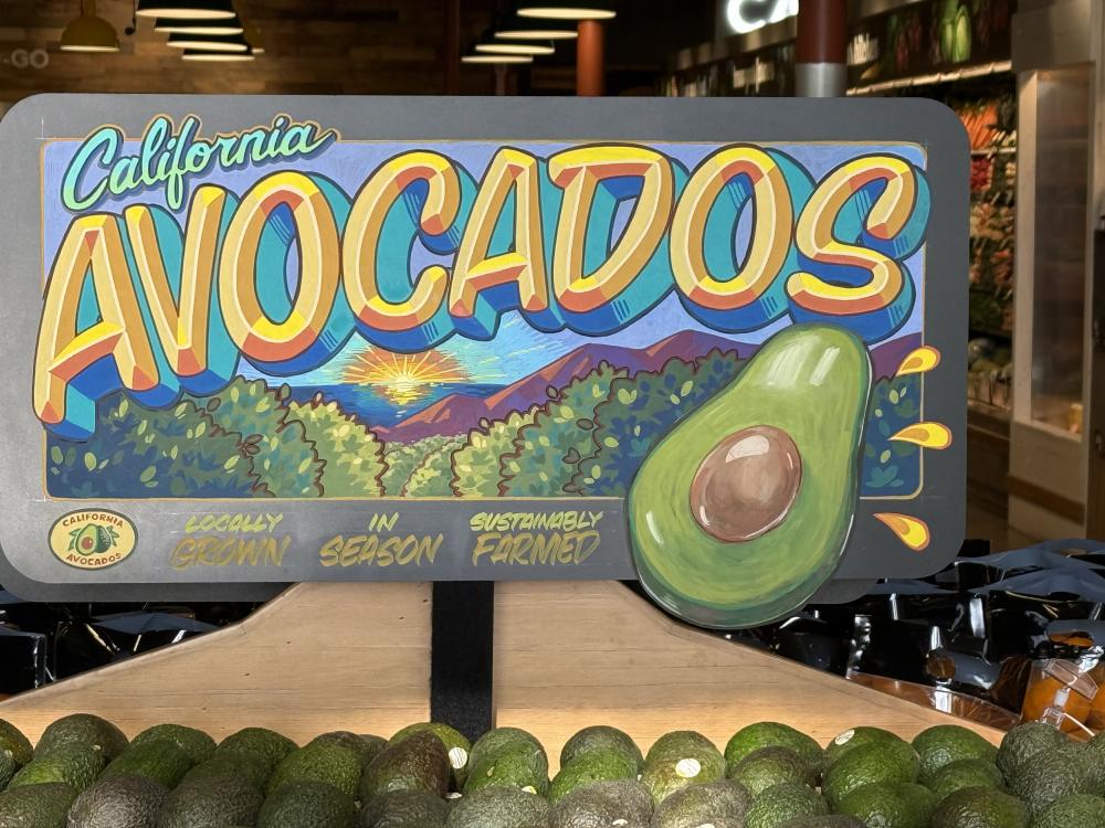 Attendees captured photos and videos of attractive California avocado displays and signage in the produce department.