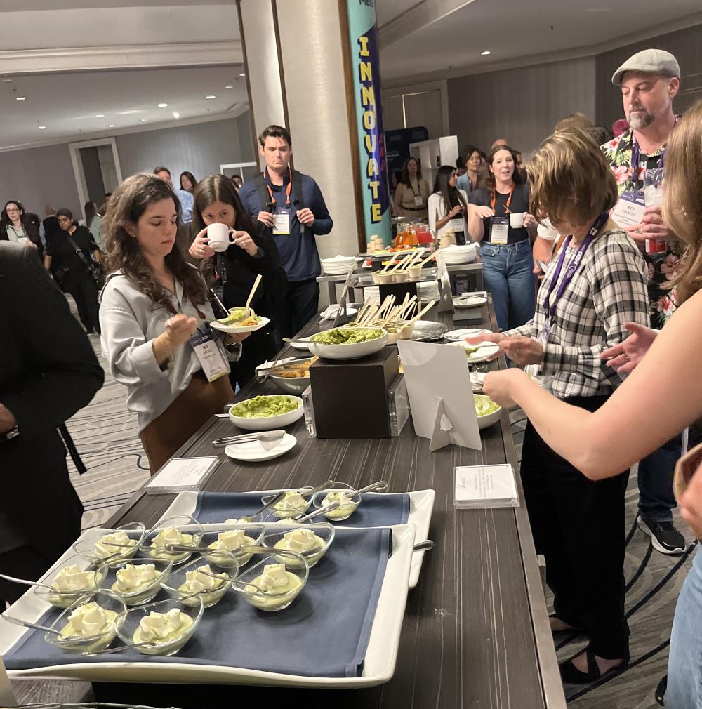 MEG attendees lined up to sample California Avocado Key Lime Pie at the MEG conference.