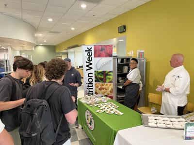 UC Santa Barbara students gathered around the California avocado table to hear about the fruit’s seasonality while enjoying a sample.