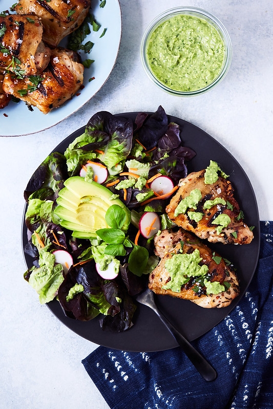 Beth Brickey of Tasty Yummies shared Grilled Marinated Chicken Thighs with a California Avocado Basil Pesto sauce.