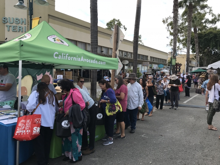 The California Avocado Commission tent, located at the entrance to the California Avocado Festival, was very popular with attendees.