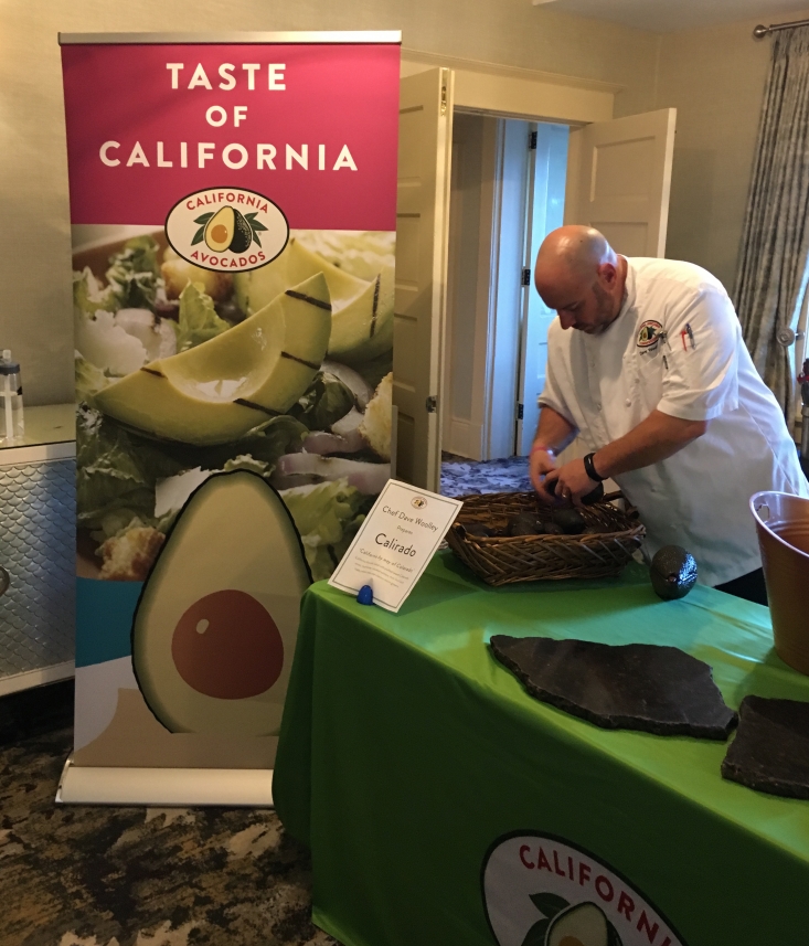 Chef Woolley prepping a California avocado dish for the Chef Showcase.