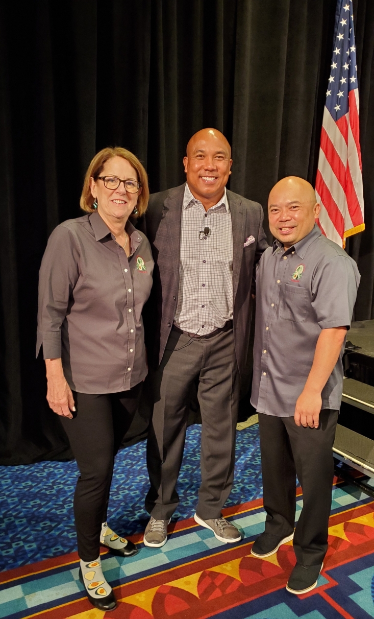 NFL star Hines Ward, the keynote speaker for the FPFC Expo, flanked by CAC’s Jan DeLyser and David Cruz.