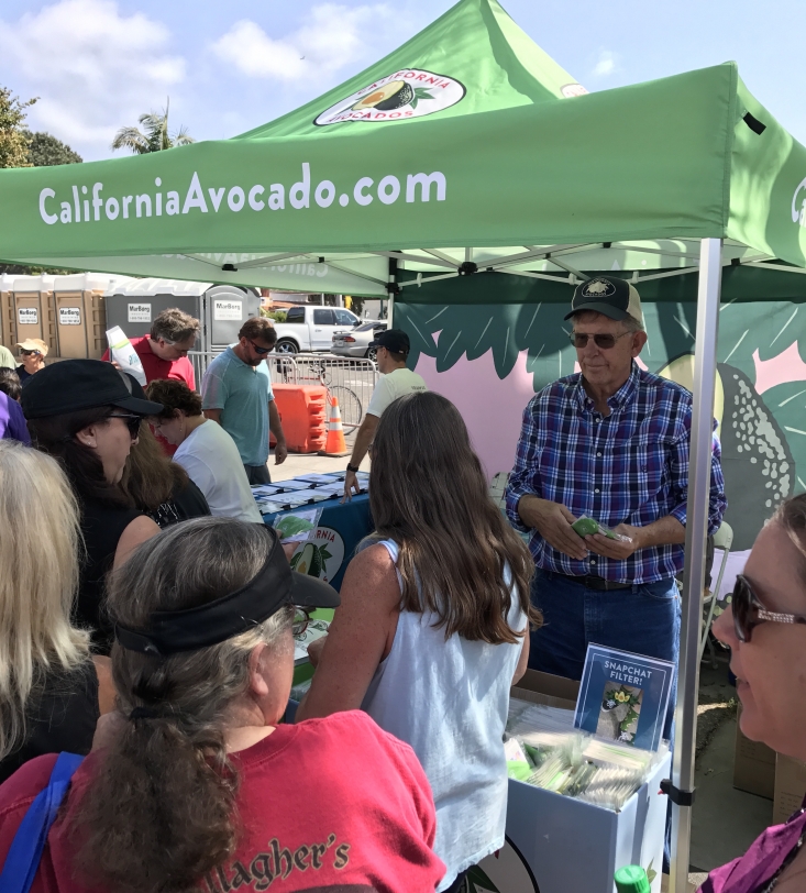 The California Avocado Commission tent, located at the entrance to AvoFest, was very popular with attendees. Board member Art Bliss volunteered to help. 