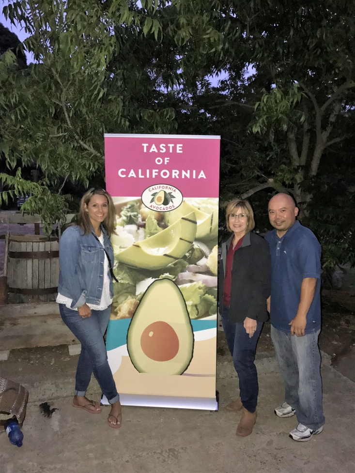 Sheryl Salazar of Albertsons/Vons, Connie Stukenberg (CAC) and Dave Cruz (CAC) at the entrance to the Taste of the Grove event.